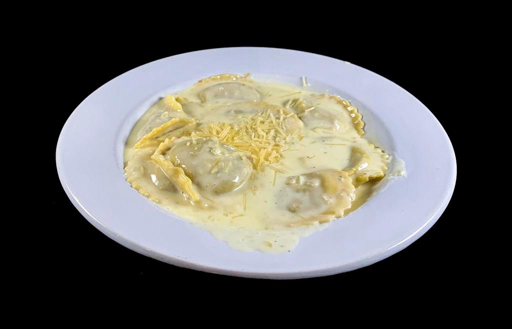 Ravioli · Choice of meat or cheese.  Served with shaved Parmesan cheese.