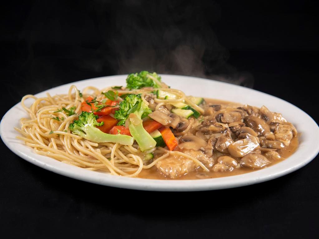 Chicken Marsala · Chicken breast sauteed in marsala wine and mushrooms. Served with spaghetti or vegetables. Topped with shaved Parmesan.
