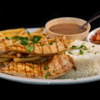 Churrasco Grelhado · Grilled beef or chicken served with rice, red beans, fries, and onion tomato salad.