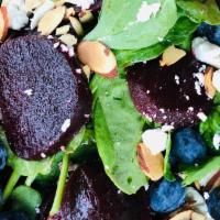 Smaak Salad  · Bed of baby spinach, sliced roasted beets, blueberries, chev ＆ toasted almonds. Served with ...