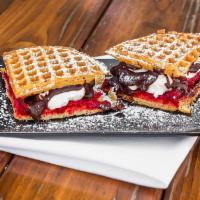 Raspberry Truffle · Raspberry jam, warm chocolate ganache and fresh whipped cream.
