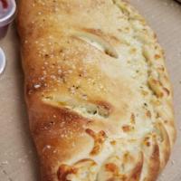 Ricotta and Mozzarella with 1 Topping Calzone · Your choice 1 topping. Add extra toppings for an additional charge.