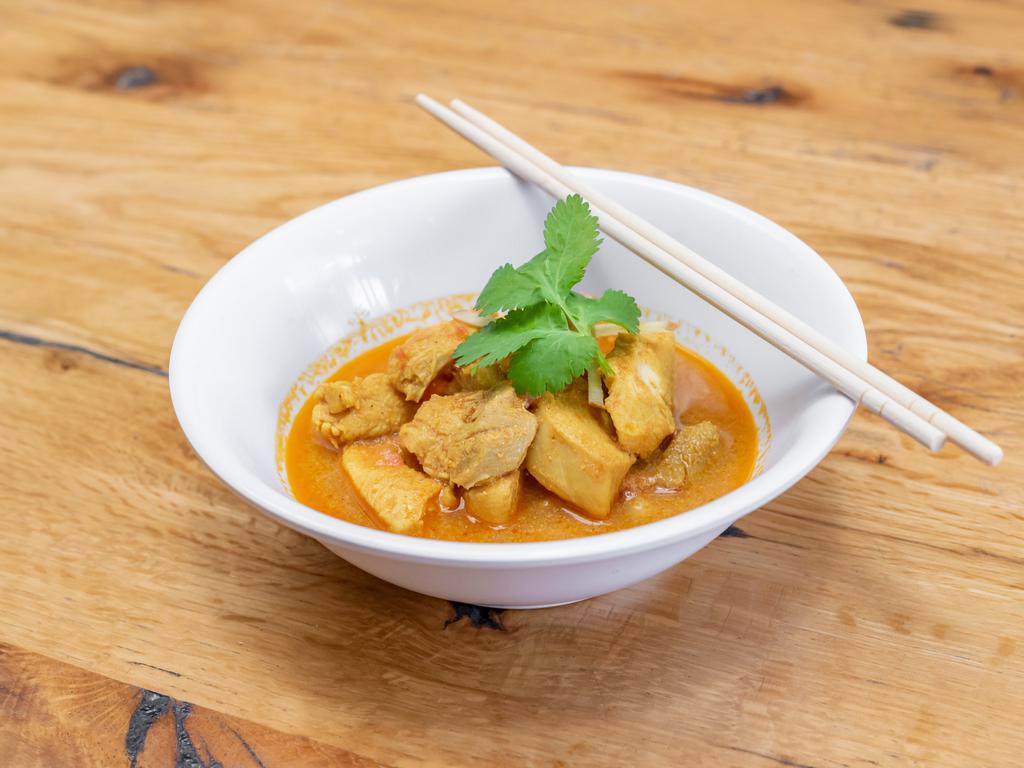 Curry Chicken · Authentic spices are perfected in this unique curry.