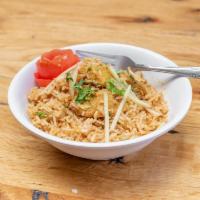Chicken Biryani · Fragrant basmati rice layered with chicken that have been cooked in a mixture of spices.