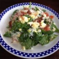 Plenty of Iron Spinach Salad · Sweet caper vinaigrette, nitrite-free bacon, toasted almonds, egg, diced tomatoes, and choic...