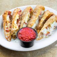 Our Famous Pizza Rolls · The Italian egg roll