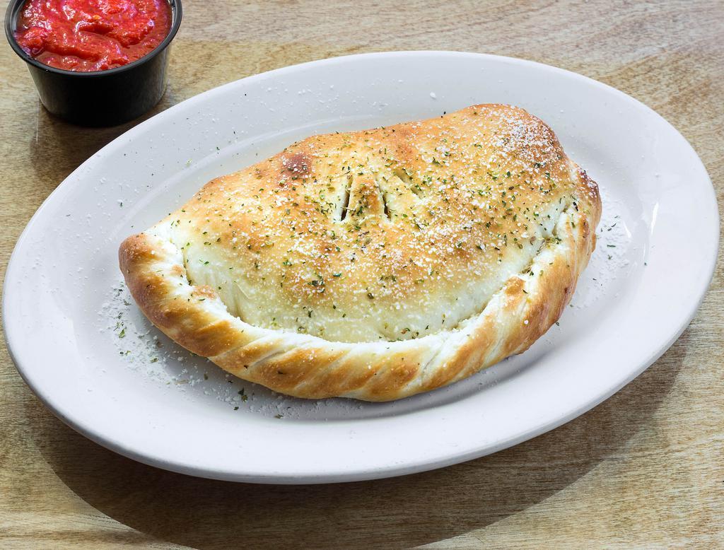 Classic Calzone · Pepperoni, Canadian bacon and sausage.
