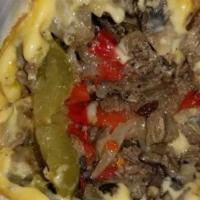 Philly Steak Wrap · Shredded steak with grilled onions, peppers, mushrooms and American cheese.