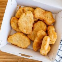 6pc ’Chicken’ Nuggets · Eight pieces of crispy ’chicken’ nuggets. Includes one sauce of your choosing on the side.