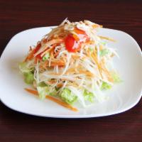 Thai Papaya Salad · Green papaya with Thai chili, garlic, string beans, tomatoes, crushed peanuts, lime juice & ...