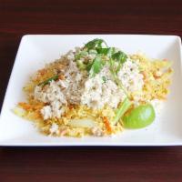 Crab Fried Rice · Stir-fried jasmine rice with egg, garlic, onion, raisins, carrots, scallion, cashes nuts & c...