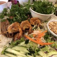 B11. Bun Tom Ga · Grilled shrimp and chicken noodle salad.

