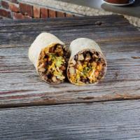 Vegetarian Burrito · Flour tortilla filled with black beans, choice of white or brown rice, lettuce, cheddar jack...