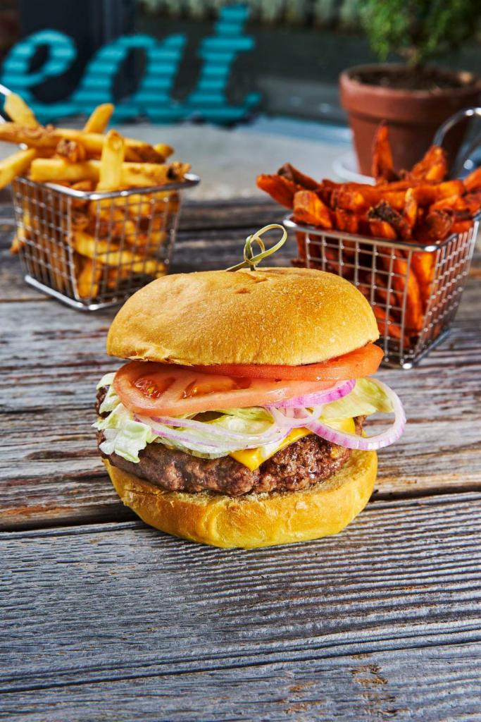 Veggie Burger · (Beyond burger) plant-based meat grilled to perfection in a separate pan. Topped with lettuce, tomato, onion, pickles & our secret burger sauce. Served on a toasted bun with fries.