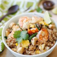R18. Seafood Fried Rice · Peeled shrimp, fish balls, imitation crab meat, white onions, green onions, carrot, and egg.

