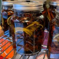 Star Anise jar · Natural honey, star Anise, cinnamon, slide lemon, mandarin peel.