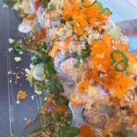 Red Hill on Fire Roll · Inside includes avocado and spicy crab salad, outside includes seared spicy tuna and special...