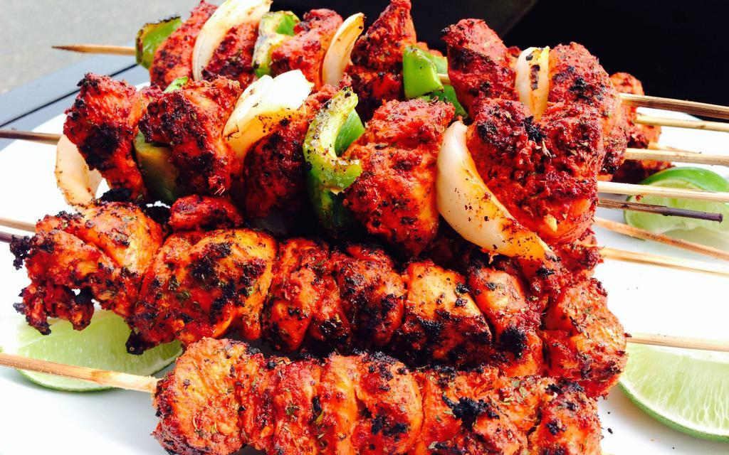 Chicken Tikka Kabab · Chicken marinated with Indian spices, yogurt, skewed & flavored until it gets tender and moist.