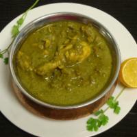 Saag Chicken Curry · Tender pieces of chicken sautéed with deliciously seasoned spinach.