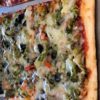 Veggie Pizza · Broccoli, mushrooms, onions, olives , and peppers. Sautéed in garlic and oil and baked to pe...
