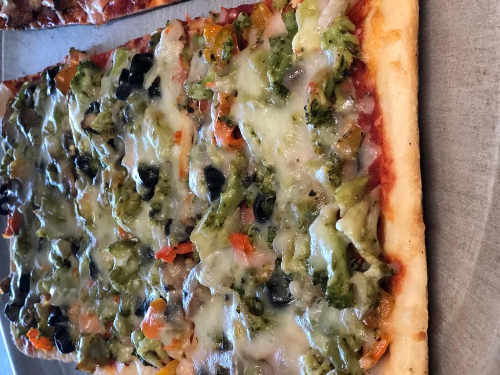 Veggie Pizza · Broccoli, mushrooms, onions, olives , and peppers. Sautéed in garlic and oil and baked to perfection on a pizza