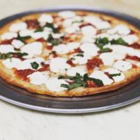 Cauliflower Pizza  · 10” Cauliflower crust pizza with a topping of your choice.  Gluten free crust. 