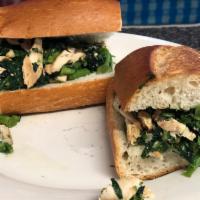 Broccoli Rabe with Grilled Chicken Hero · Grilled chicken with broccoli rabe served on fresh Italian toasted bread