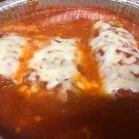 Eggplant Rollatini · Eggplant stuffed with ricotta, Parmigiana and mozzarella. Served with choice of side and 2 o...