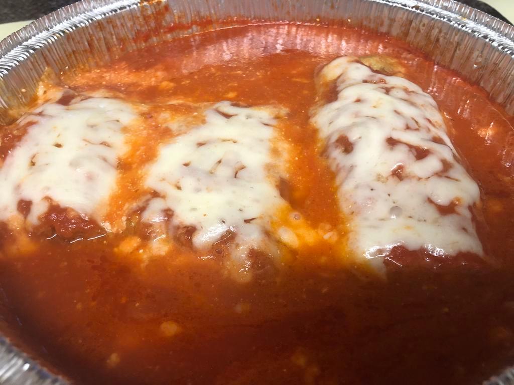 Eggplant Rollatini · Eggplant stuffed with ricotta, Parmigiana and mozzarella. Served with choice of side and 2 of our 
