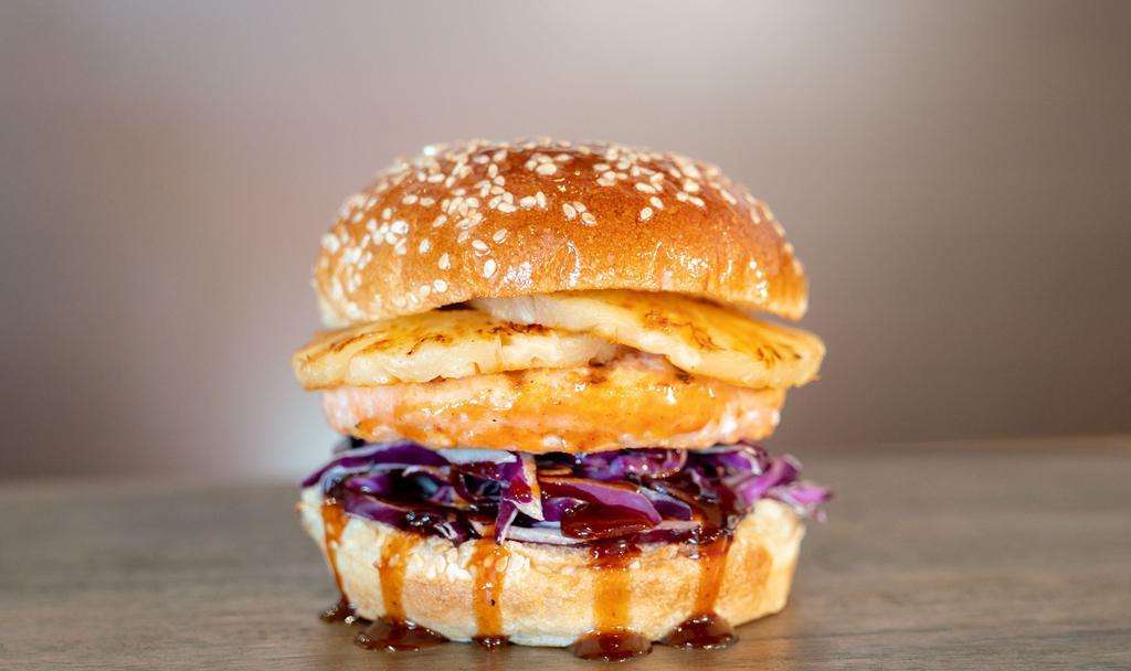 Hawaiian Salmon  · 1/4 lb. Salmon Patty, styled with our Hawaiian toppings including our  red cabbage slaw tossed with ginger vinaigrette, our signature barbecue glaze, and topped with grilled pineapple. Pescatarians Delight!