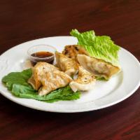 Pot Stickers · 6 pieces. Pan-fried or steamed dumplings with chicken.