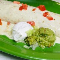 Burrito Telcome · Large flour tortilla stuffed with your choice of chicken, ground beef or shredded beef, rice...