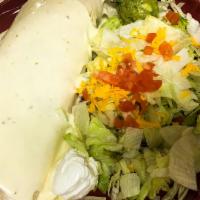 Burrito Hacienda Special · A big burrito. Made with homemade flour tortilla filled with shrimp, grilled chicken, bacon,...