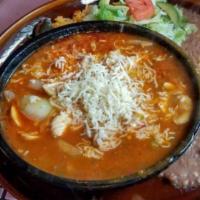 Molcajete · Delicious bowl of chicken and beef, sauce with mushrooms, onions and Monterey Jack cheese. S...