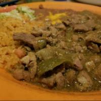 Chile Verde · Chunks of pork cooked in a light tomatillo sauce (salsa verde) with green peppers, onions an...