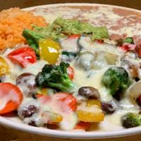 Carnitas Casa Hacienda · Steak or Chicken with zucchini, carrots, bell peppers and mushrooms. Covered with cheese sau...