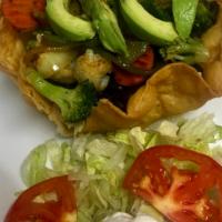 Veggie Taco Salad · Black beans, lettuce, mushrooms, cauliflower, broccoli, zucchini, carrots, onions and pepper...