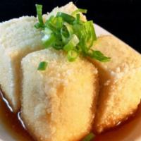 Agedashi Tofu  · 4 pieces. Silken soft tofu, cut into cubes and lightly deep fried.