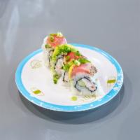 4 Piece Tataki Roll · Crab salad and cucumber inside. Topped with seared pepper tuna, avocado, green onions and po...