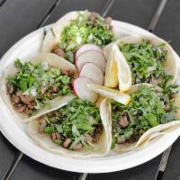 5  beef Tacos · Corn tortillas, your choice of meat topped with onions and cilantro. Carnitas, beef, chicken...