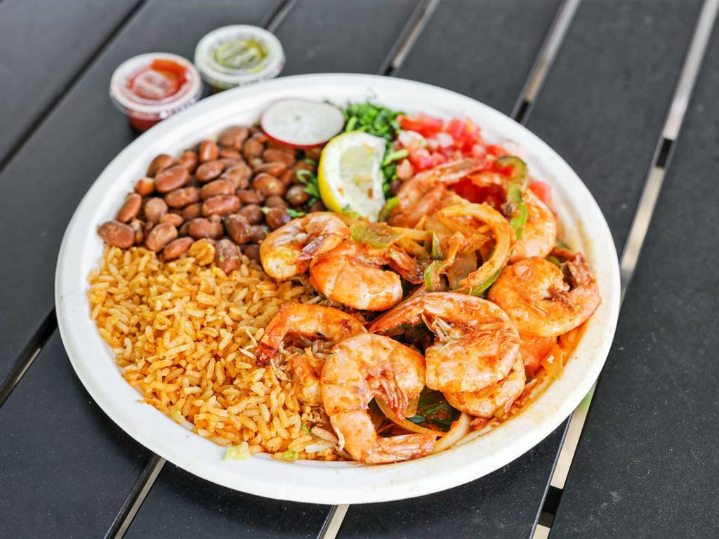 Camarones a La Diablo · Shrimp with green bell pepper, onion, pico de gallo, and is served with rice and beans.
