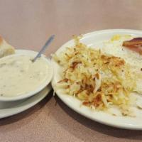 #3. Mama's Favorite Breakfast Special · 2 eggs with hash browns or grits  and homemade biscuits & sausage gravy