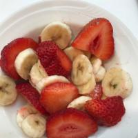 Bowl of Fruit · Fresh strawberries and bananas.