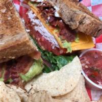 BLT Sandwich · Bacon, lettuce and tomato served on toasted multi-grain bread with garlic herb spread.