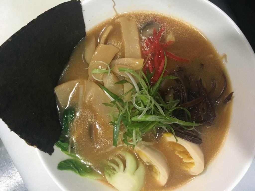 5. Vegetable Ramen · Miso and seaweed base broth topped with black fungus, red ginger, bamboo shoots, scallion, basil egg, bean sprout and Asian vegetables.