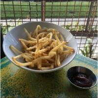 Mojo Fries & House-made ketchup · Shoe string fries with garlic mojo to drizzle and house-made ketchup to dip!