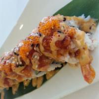 Orange Dragon Roll · Shrimp tempura, crab meat & cucumber topped with marinated salmon, tobiko, eel sauce & spicy...