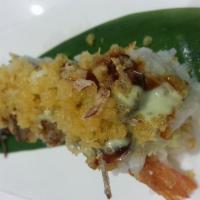 Crunch Tiger Roll · Shrimp tempura, crab meat & cucumber topped with deep-fried eel, tempura flake, tobiko, eel ...