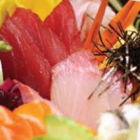Chirashi · Assortment of sashimi served over sushi rice.