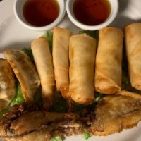 H.T. Combo Lunch · Spring rolls, shrimp rolls, dumplings and BKK wings.